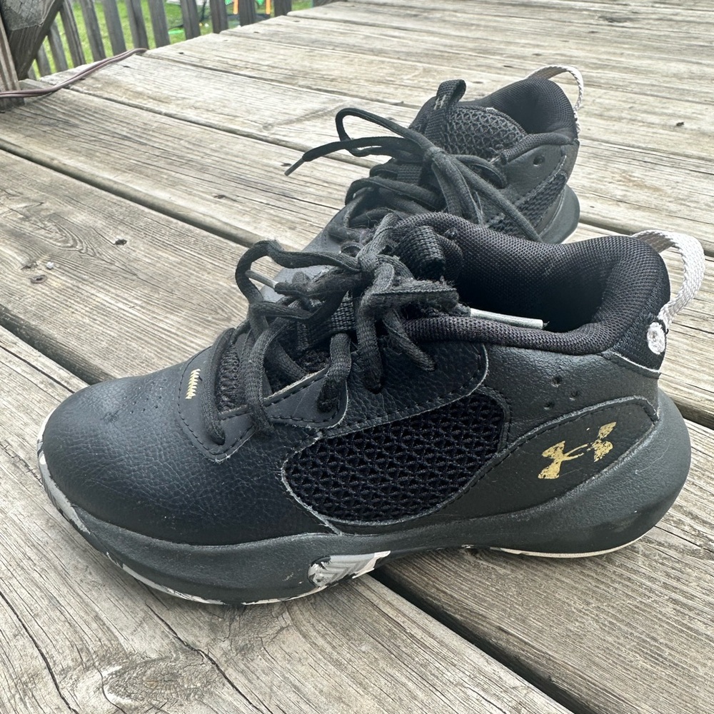 Under Armour Black and Gold Sneakers Mid-Top Design